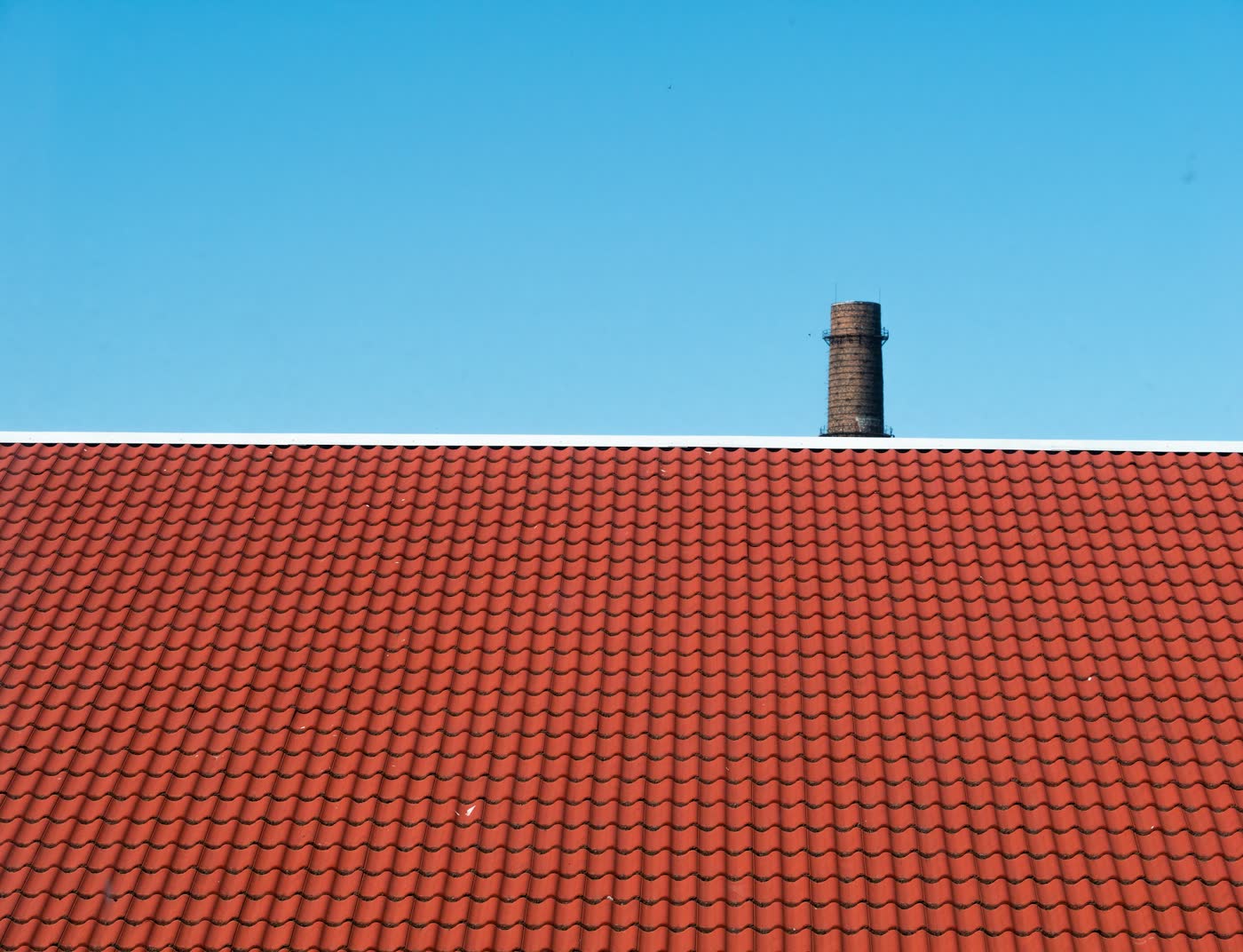 Example after: the same roof, clean and fully tiled