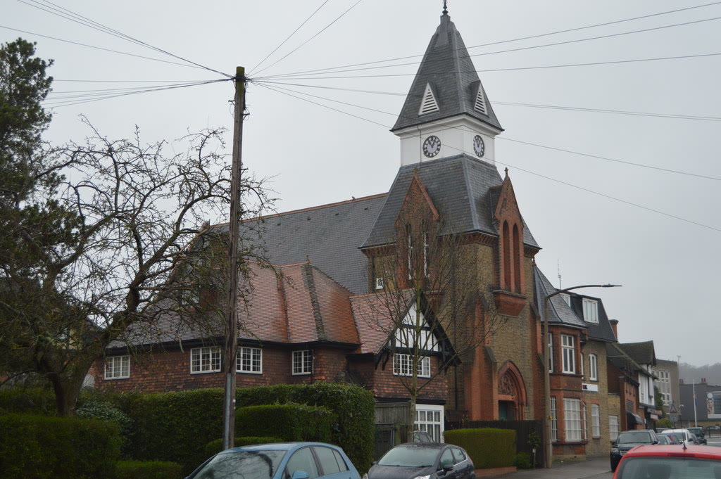 Lopping Hall in Loughton, with its slate roof and clock tower
